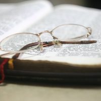 eyeglass with gold colored frames