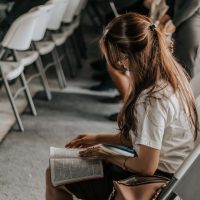 woman holding book
